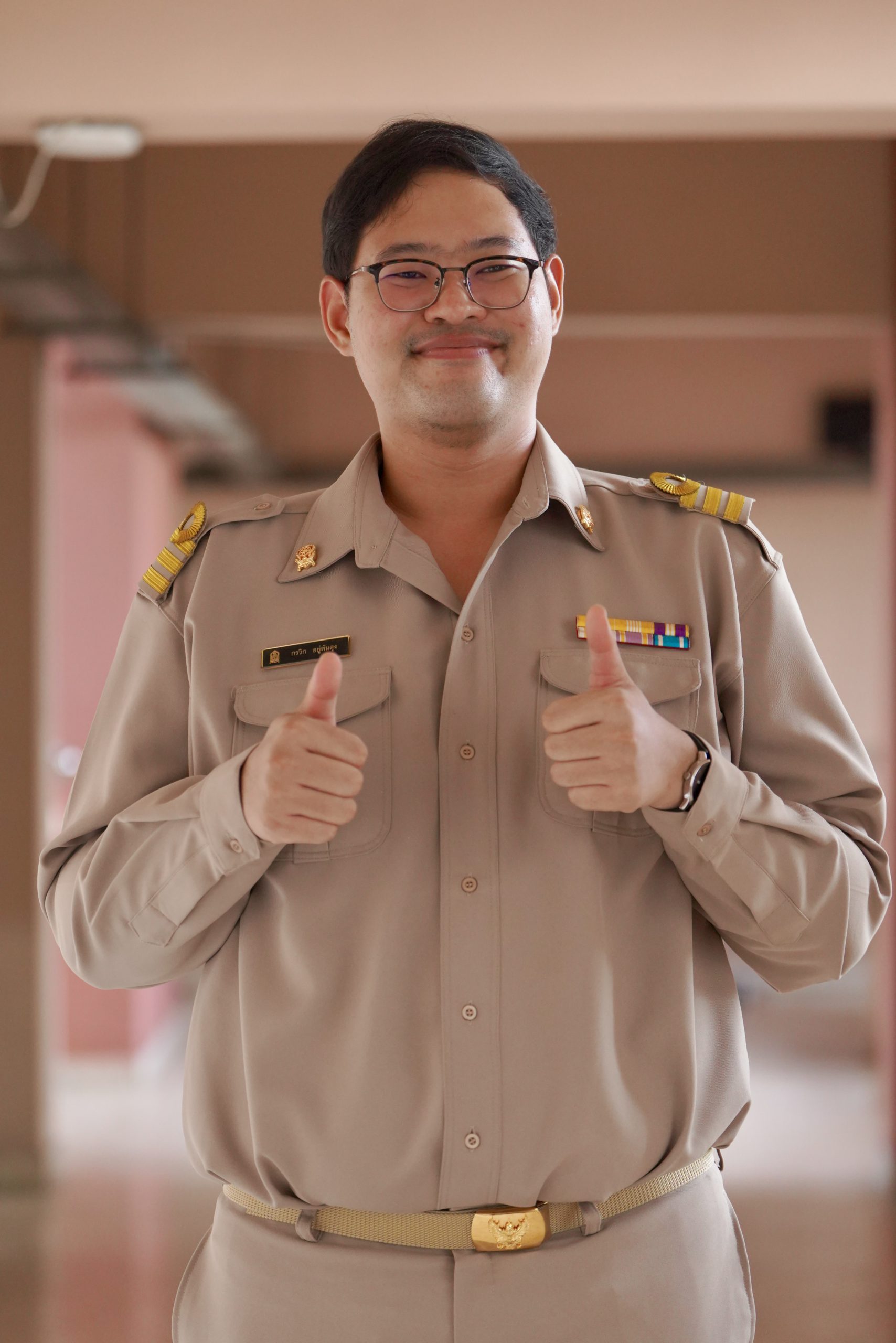 นายกรวิก อยู่พันดุง